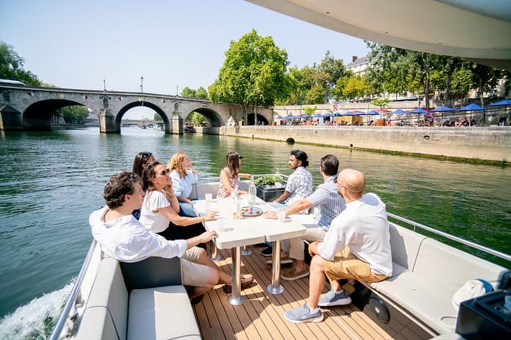 2-12 pax Private River Boat Tour in Paris with Rosé and Macarons — photo 6