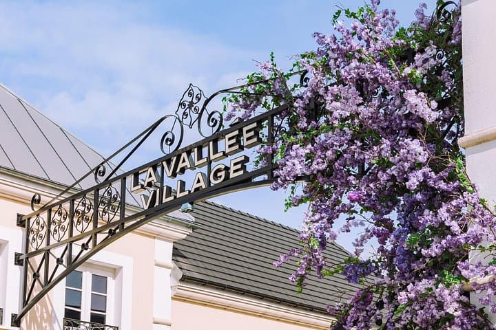 Shopping Tour to La Vallée Village Outlet in a Private Car or VAN